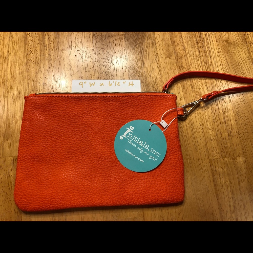 Initials Inc. orange clutch purse
